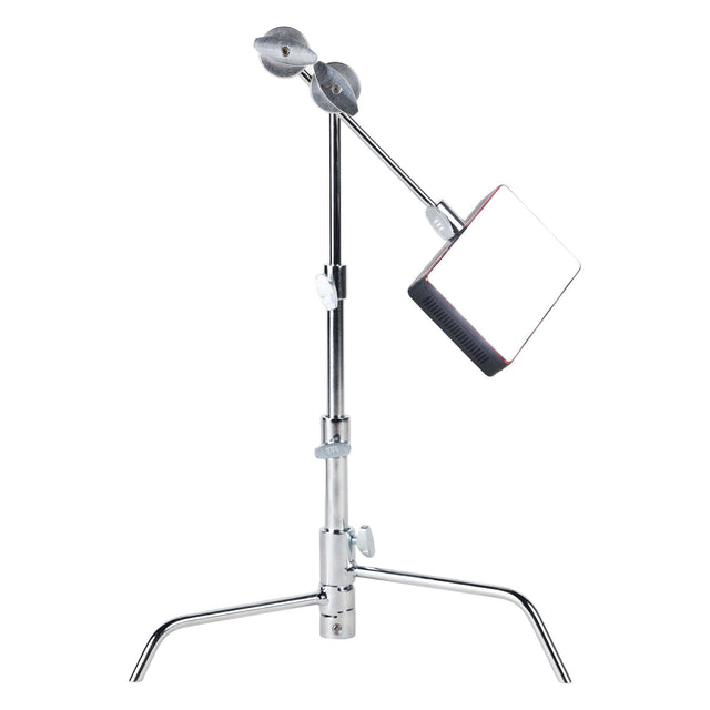 5" Pocket C-Stand with adjustable height and mounted light, ideal for product photography and tabletop shoots.