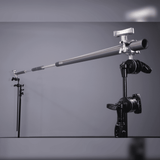 Telescoping Grip Rail system mounted on stands, ideal for rigging cameras and lights in professional imaging setups.