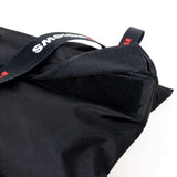 Close-up of a black sandbag showing durable Cordura material and strong Velcro closure for secure weight support.