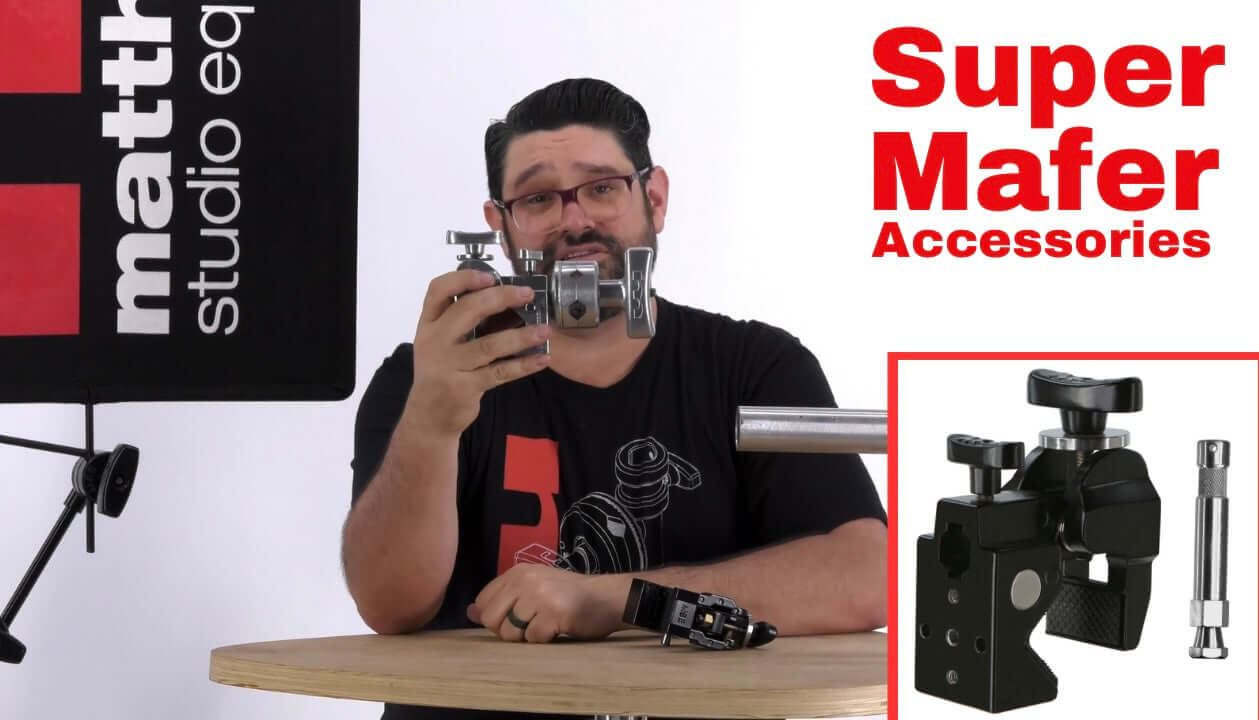 Person showcasing Super Mafer accessories with studio equipment, demonstrating versatility and features.